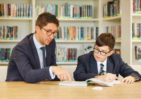 teacher and student in the library