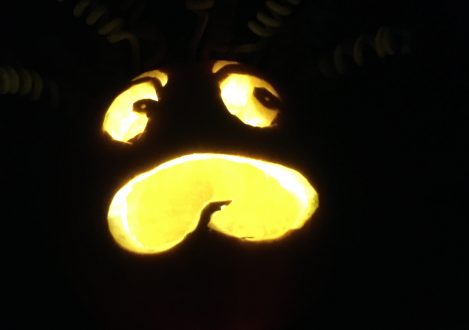 carved pumpkin lit up