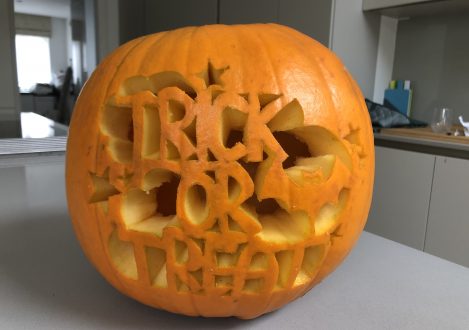 One of the pumpkin carving creations made by a student. The carving says "trick or treat" in the center.
