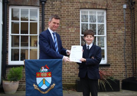 Halliford School boy with LAMDA Exam award