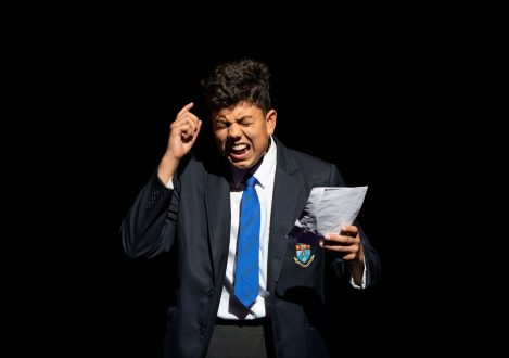 boy holding paper