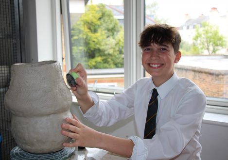 students in pottery class