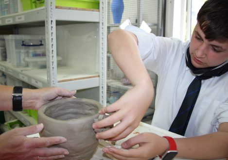 students in pottery class