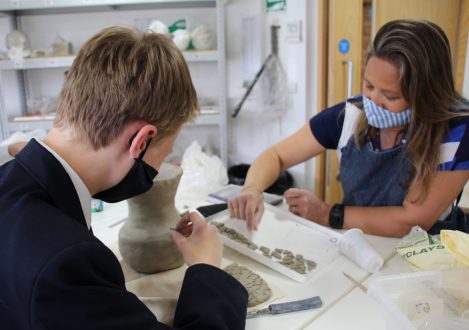 students in pottery class