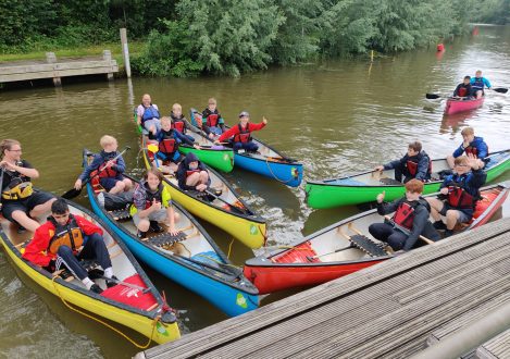 students canoeing