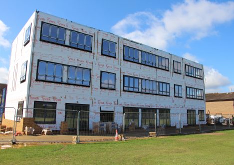 exterior of a school building being built