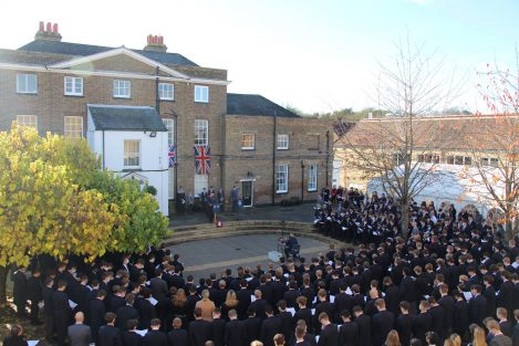 crowds of children watching an assembly