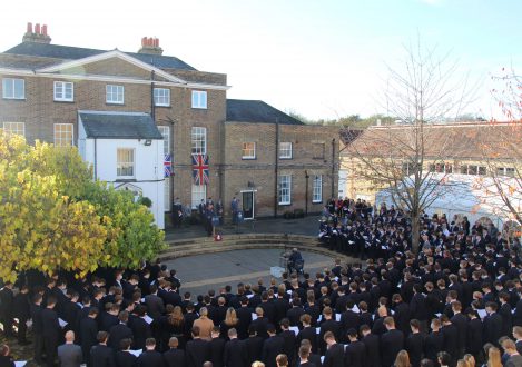 crowds of children watching an assembly