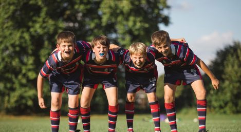 4 students in rugby uniform