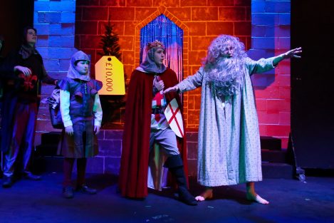 Students acting in Spamalot Play