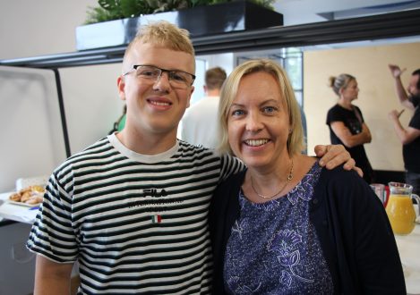 boy with his mum smiling