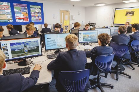 children sat at computers