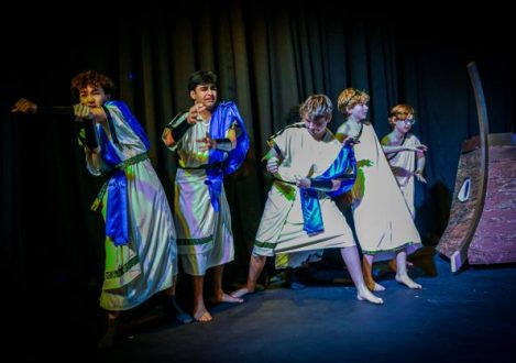 students performing a play