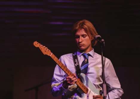 boy playing guitar