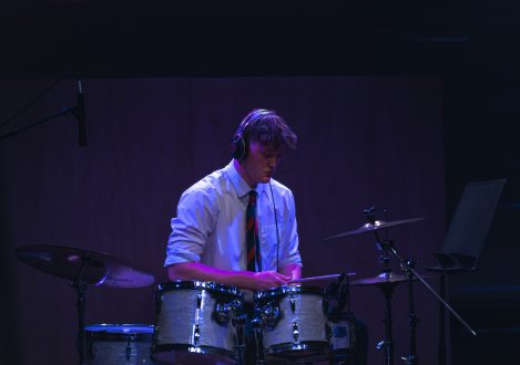 boy using the drums