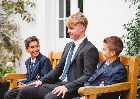 3 students on a bench