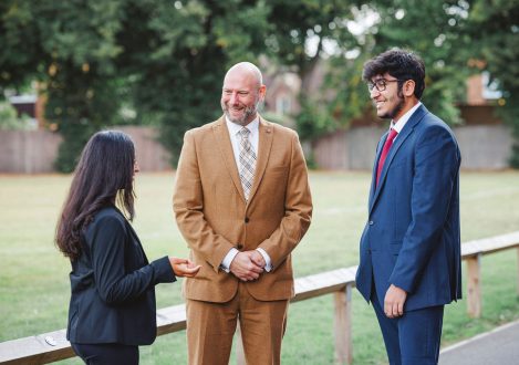 students and teachers talking