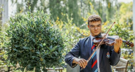 student playing violin