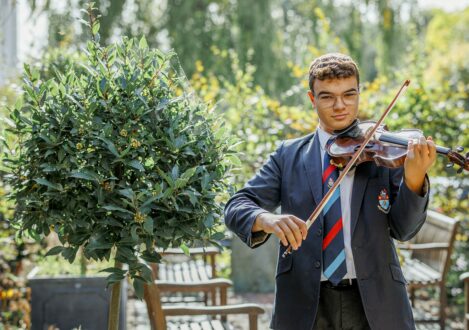 student playing violin