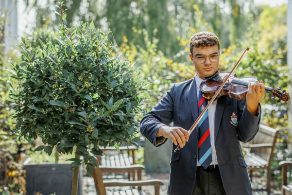 student playing violin