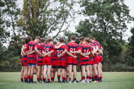 rugby players in a circle