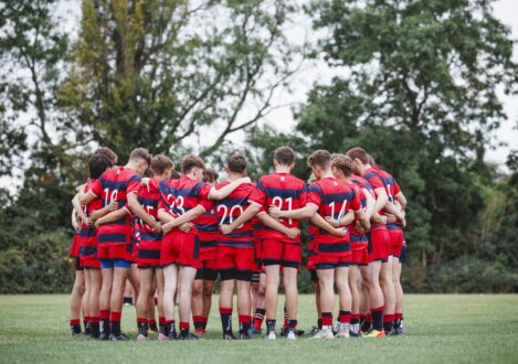 rugby players in a circle