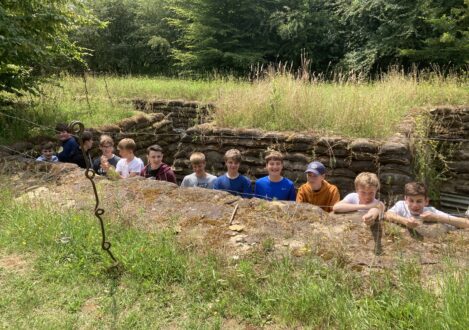 students in a trench