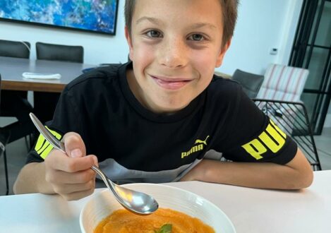 boy eating soup