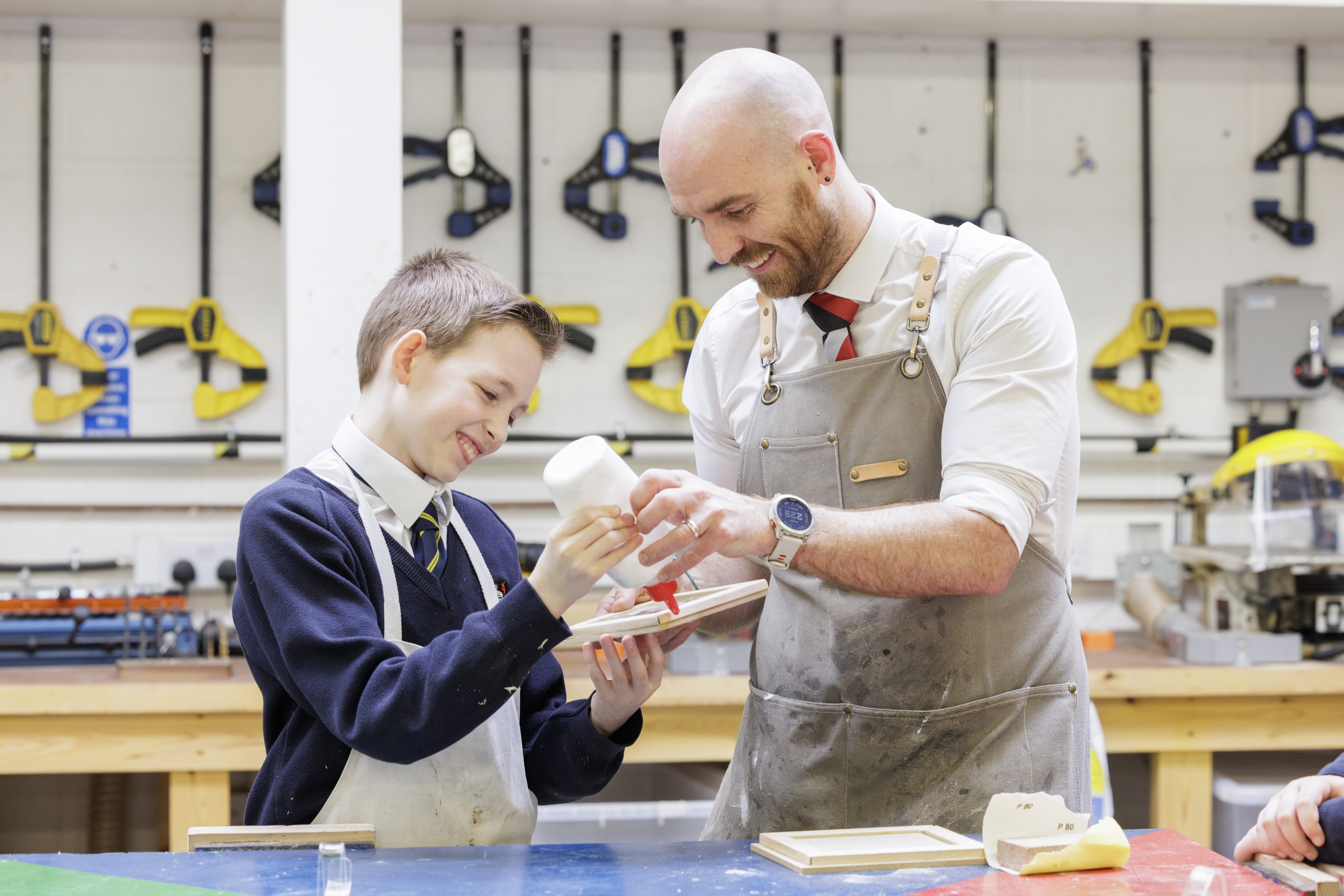 teacher and students in DT class
