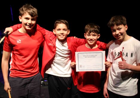 students holding a certificate