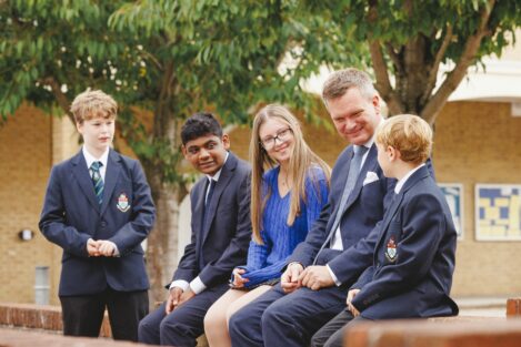 students with their head teacher