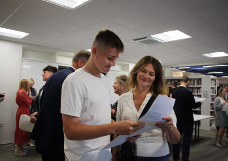 student and parent looking at exam results