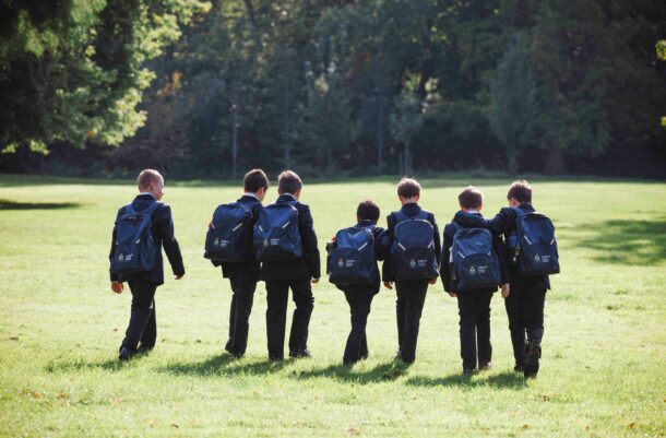 students wearing backpacks