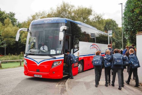 students getting onto a coach