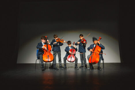 students playing cellos