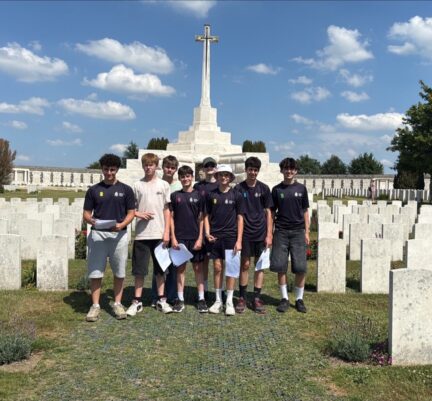 students in a graveyard